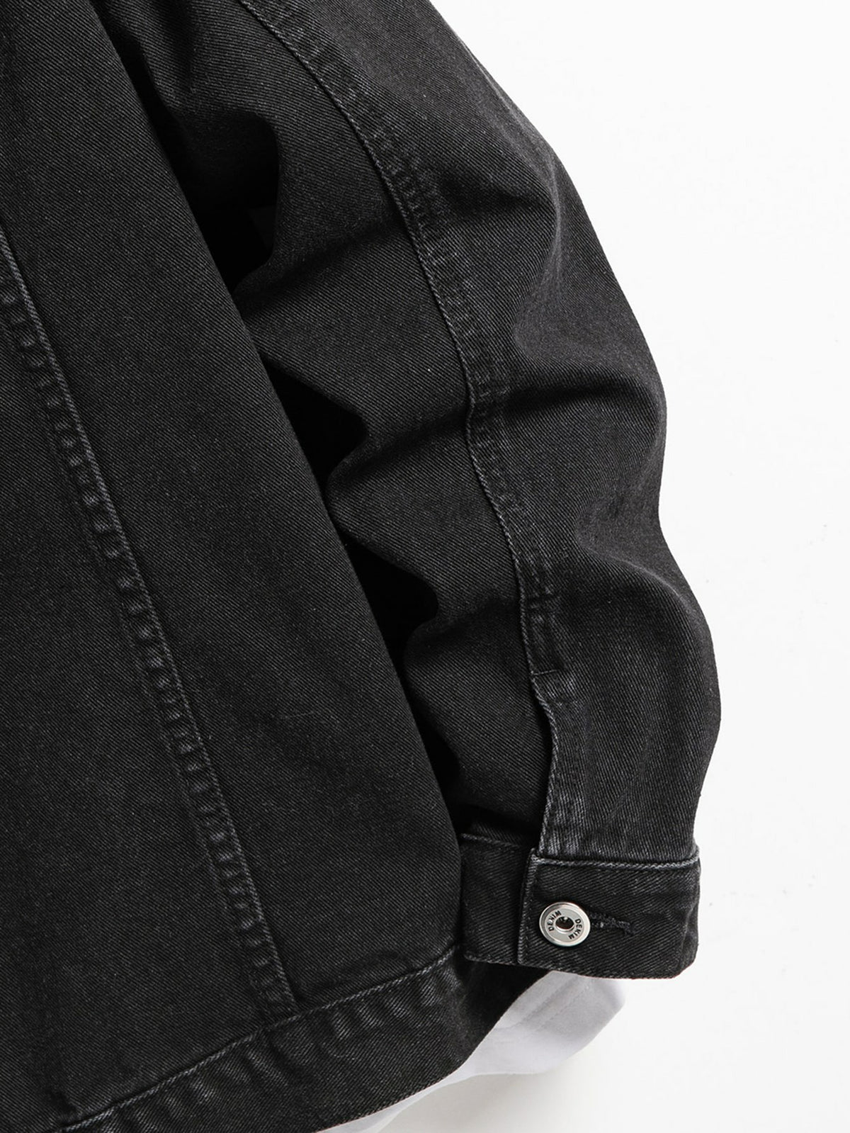 Schwarze Jeansjacke – Ärmel und Manschette
